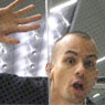 Marc behind safety glass.